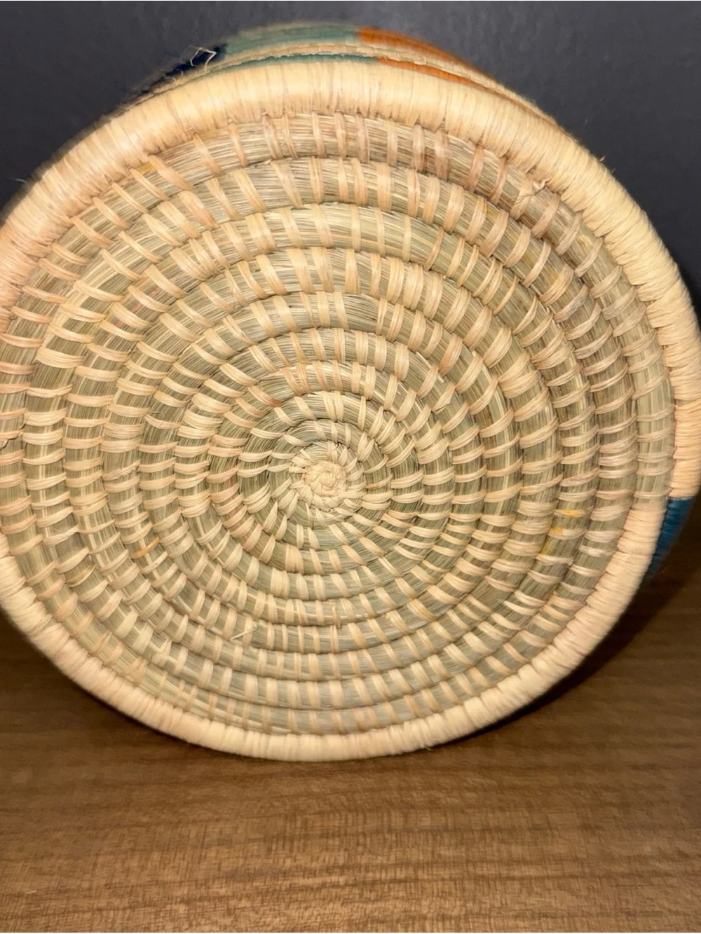 Handwoven Natural Basket with Red and Blue Accents